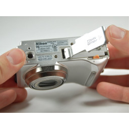 Замена батареи Nikon COOLPIX P2